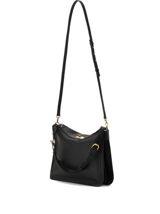 Black handbag with a gold clasp by Lanvin