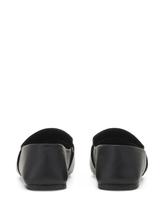 Lanvin leather loafers with a logo plaque. A square toe, premium calf leather construction and an elegant slip-on silhouette for everyday sophistication.