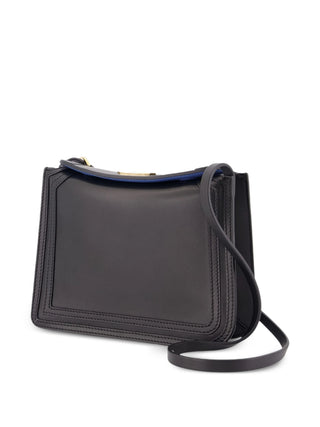 Lanvin Compagnon 20. Sculptural leather cross-body with gold-tone hardware and adjustable strap. Available at our Lisbon store. 