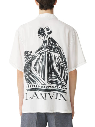 Person wearing a white t-shirt with black graphic design and 'LANVIN' branding on the back.