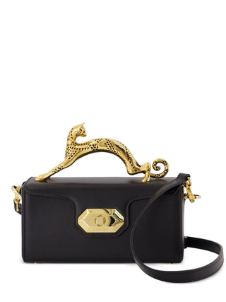The Compagnon 16 asymetrical bag from Lanvin. Sculptural cat-shaped jewelry handle, sleek leather, and Italian craftsmanship. A collector's piece.