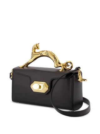 The Compagnon 16 asymetrical bag from Lanvin. Sculptural cat-shaped jewelry handle, sleek leather, and Italian craftsmanship. A collector's piece.