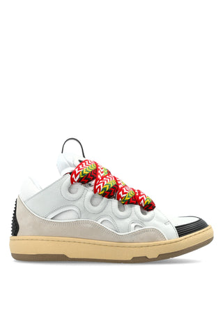 Lanvin Curb sneakers with panelled leather, chunky '90s silhouette, and signature oversized laces. A cult-status classic that is available at our Lisbon store. 