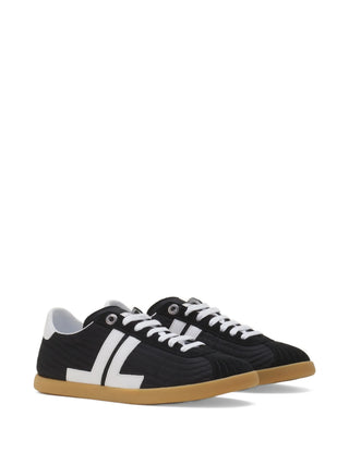 Lanvin Glen sneakers with horizontal quilted stitching. Refined low-top silhouette, breathable lining, and a honey-toned rubber sole. 
