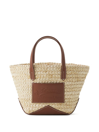 Woven straw handbag with brown leather accents by Lanvin