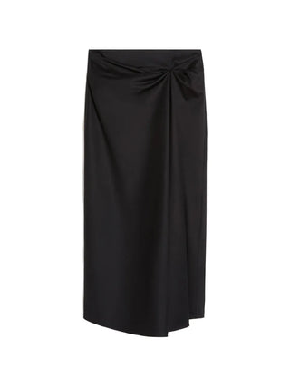Max Mara midi skirt with exquisite waist knotting. Luxurious satin, linen, or silk blend. A timeless Italian investment piece. Available at our Lisbon store.
