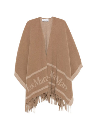 Logo-print fringed poncho by MAX MARA. 100% wool with logo lettering and fringe detailing. A versatile layering piece for any occasion, available at our Lisbon store. 