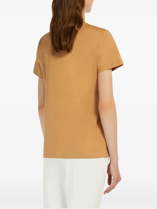 Max Mara monogram T-shirt. Pure cotton jersey, classic crewneck, and signature embroidered chest pocket. Italian craftsmanship available at our Lisbon store. 