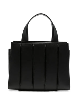 Paneled leather tote bag by Max Mara. Crafted from smooth calfskin. Features top handles, a detachable shoulder strap, and internal pockets. 