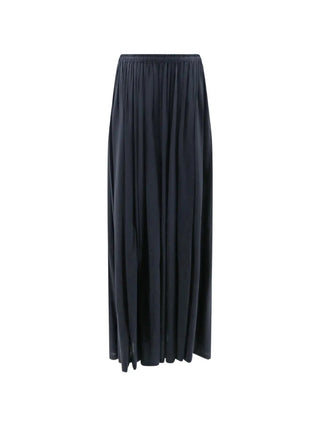 Max Mara pleated maxi skirt. Stitched pleats, fluid movement, and an elasticated waist. Timeless Italian elegance available at our Lisbon store. 