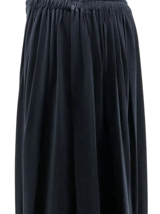 Max Mara pleated maxi skirt. Stitched pleats, fluid movement, and an elasticated waist. Timeless Italian elegance available at our Lisbon store. 