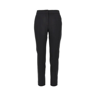 MAX MARA cropped trousers with a pressed crease and concealed fastening. A tailored, mid-rise silhouette. Italian craftsmanship, available at our Lisbon store.