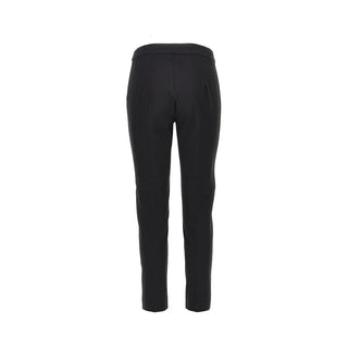 MAX MARA cropped trousers with a pressed crease and concealed fastening. A tailored, mid-rise silhouette. Italian craftsmanship, available at our Lisbon store.