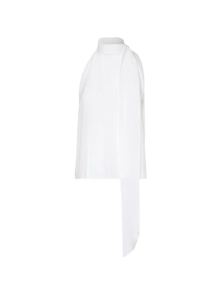 MAX MARA pussy-bow top. Sleeveless silk design with a feminine bow. Italian craftsmanship redefined. Available at our Lisbon store.