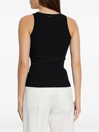 Max Mara ribbed vest top. Premium knit, subtle logo detailing, and impeccable Italian craftsmanship that can be found at our Lisbon store. 