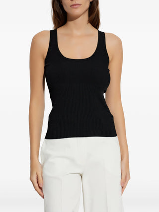 Max Mara ribbed vest top. Premium knit, subtle logo detailing, and impeccable Italian craftsmanship that can be found at our Lisbon store. 