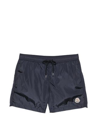 Moncler Boxer Mare swim shorts. 100% polyamide with logo patch, elastic drawstring, side and rear pockets. Quick-drying luxury, available at our Lisbon store.