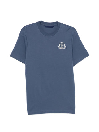 Moncler logo-print T-shirt. 100% cotton with signature front logo. Regular fit, crewneck, and versatile style.  Available at our Lisbon store.
