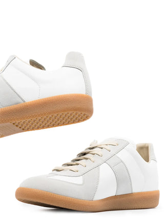 White sneakers with brown rubber sole by Maison Margiela