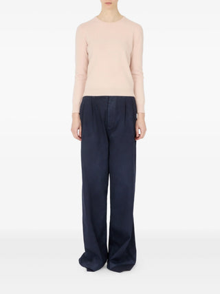 Maison Margiela pale pink fine-knit crew-neck T-shirt with ribbed cuffs. A soft essential for refined everyday wear, available at our Lisbon sto