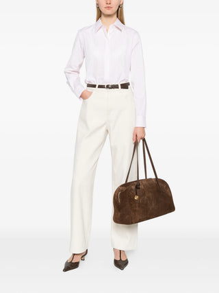 The stripe shirt from MAX MARA. Crisp fabric, timeless pattern, and effortless elegance for work or weekend. Available at our Lisbon store. 