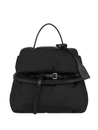 Moschino black Tie Me tote with top handle, buckle fastening, and protective dust bag. A compact daily bag, available at our Lisbon store.