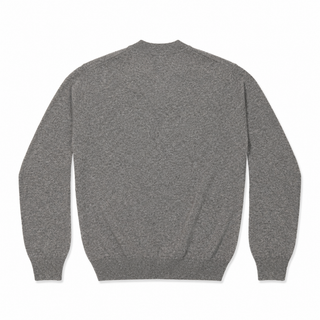 Comme Des Garçons PLAY emblem knit in light grey with a pink heart patch. A V-neck, fine wool sweater with ribbed trims for a refined look.