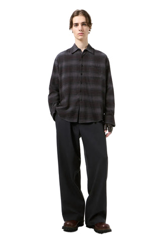 The Above shirt from Our Legacy. A refined, slightly oversized button-down with a chest pocket and mother of pearl buttons. Available at our Lisbon store. 