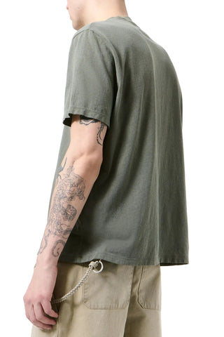 OUR LEGACY Box short-sleeve t-shirt. A relaxed, boxy fit in 100% cotton jersey. Vintage-washed for a soft, worn-in feel. Available at our Lisbon store. 