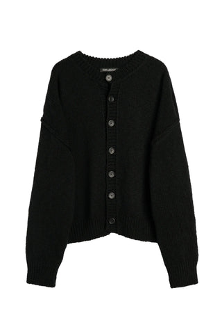 Our Legacy Pitch cardigan. Slub-twisted Italian wool in a generous, proportion-led silhouette. Exposed seams and leather buttons for a tactile finish. 