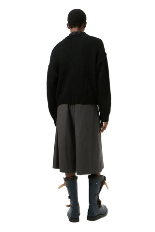 Our Legacy Pitch cardigan. Slub-twisted Italian wool in a generous, proportion-led silhouette. Exposed seams and leather buttons for a tactile finish. 