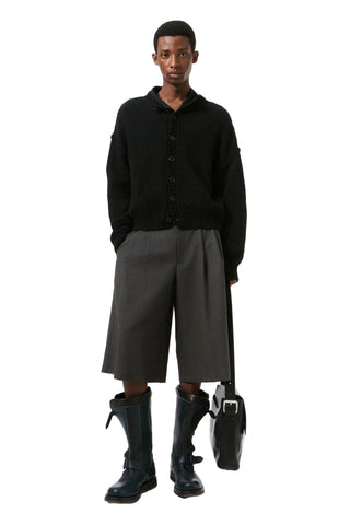 Our Legacy Pitch cardigan. Slub-twisted Italian wool in a generous, proportion-led silhouette. Exposed seams and leather buttons for a tactile finish. 