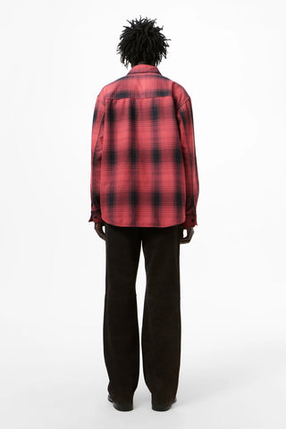 Our Legacy Ranch check-pattern shirt. Red cotton, classic collar, front button fastening, two chest pockets, and a curved hem. Available at our Lisbon store.