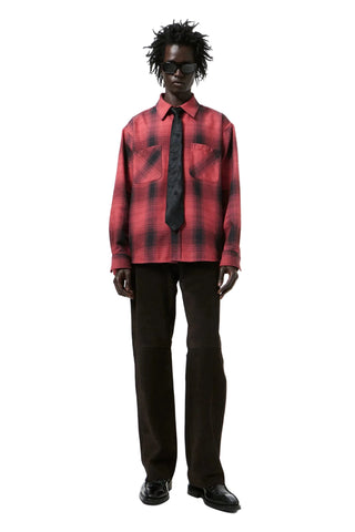 Our Legacy Ranch check-pattern shirt. Red cotton, classic collar, front button fastening, two chest pockets, and a curved hem. Available at our Lisbon store.