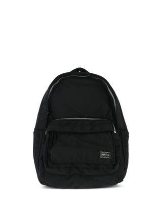 PORTER Tanker Backpack in black with top zip fastening, logo patch and adjustable shoulder straps, available at our Lisbon store