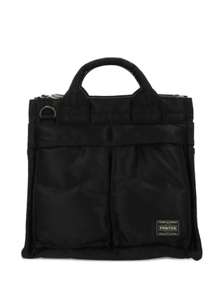 PORTER Tanker Square Tote Bag in black with zip fastening, front pockets and adjustable strap, available at our Lisbon store.
