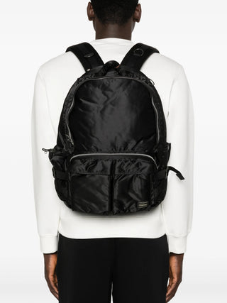 PORTER Tanker Zip Backpack in black with zip fastening, front pockets and adjustable straps, includes dust bag and is available at our Lisbon stor