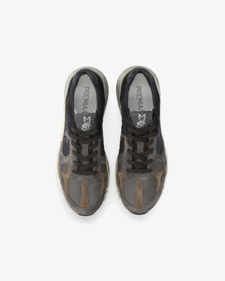 Premiata Mase 25 sneakers. Suede-panel and technical fabric construction. Chunky sole, logo details, and Italian craftsmanship. Available at our Lisbon store. 