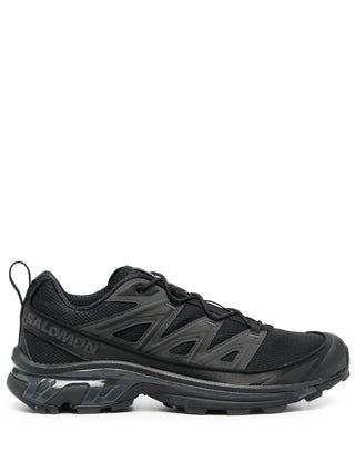 Salomon panelled mesh sneakers. Breathable 3D mesh upper with protective film. Quicklace™, EVA cushioning, and a chunky rubber lug sole for stability.