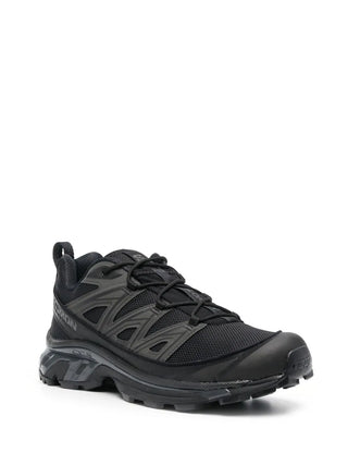 Salomon panelled mesh sneakers. Breathable 3D mesh upper with protective film. Quicklace™, EVA cushioning, and a chunky rubber lug sole for stability.