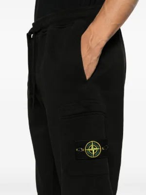Track pants with the iconic detachable Compass badge. Cotton jersey, side pockets, and a modern tapered fit. Available at our Lisbon store. 