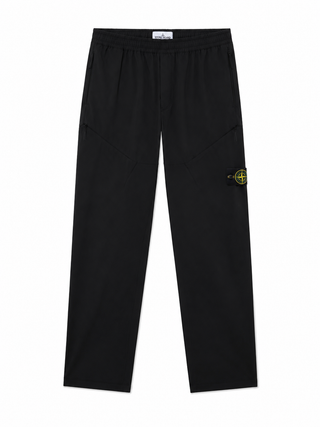 Logo track pants by Stone Island. Crafted from  a technical polyamide-elastane blend with a regular-fit for comfort and an iconic side badge.