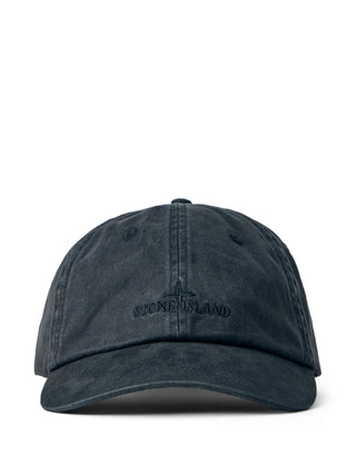Stone Island logo-embroidered baseball cap. Six-panel design in cotton, denim, or shell. Adjustable strap and signature branding. Available at our Lisbon store.