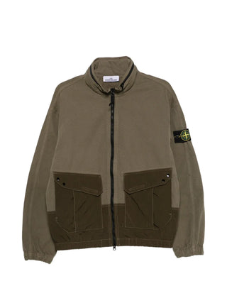 Logo-patch panelled jacket by Stone Island. Featuring a hood, multiple pockets, elasticated cuffs, and a garment-dyed finish. Available at our Lisbon store. 