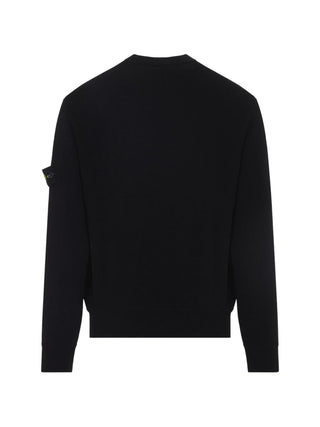 Logo-patch sweater from Stone Island. Classic crewneck, fine ribbed knit, and signature sleeve badge. Comfortable, premium essentials for any rotation.