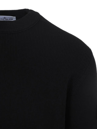 Logo-patch sweater from Stone Island. Classic crewneck, fine ribbed knit, and signature sleeve badge. Comfortable, premium essentials for any rotation.