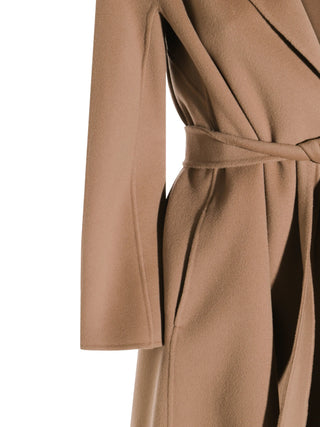 'S Max Mara belted coat. Sculptural robe silhouette in pure virgin wool. Signature Italian understated luxury, available at our Lisbon store. 