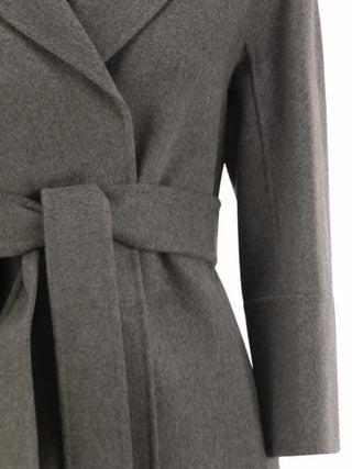 'S Max Mara belted coat. Sculptural robe silhouette in pure wool. Signature Italian understated luxury, available at our Lisbon store. 