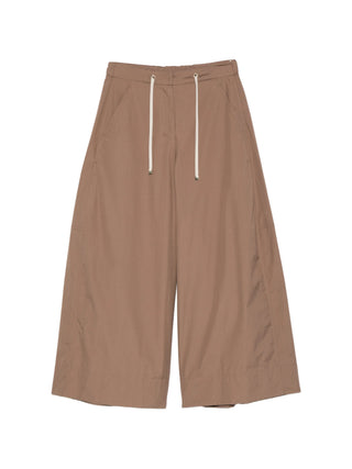 'S Max Mara palazzo pants. Wide-leg silhouette with a drawstring waist, side pockets, and a flowing fit. Italian craftsmanship. Available at our Lisbon store.
