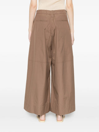 'S Max Mara palazzo pants. Wide-leg silhouette with a drawstring waist, side pockets, and a flowing fit. Italian craftsmanship. Available at our Lisbon store.